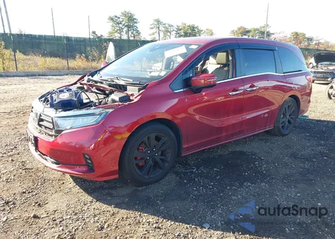 2022 Honda Odyssey Touring z USA, uszkodzony, nr VIN 5FNRL6H85NB067343